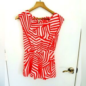 Orange coral and white top with open back flows boutique size small